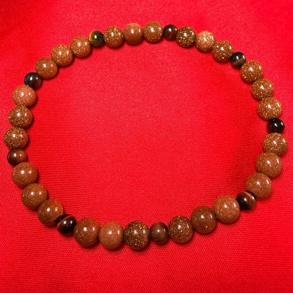 Elegant stretch bracelet-Goldstone/Tiger’s eye gemstones.Healing,energy.8”-8.5”